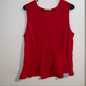 Red sleeveless blouse